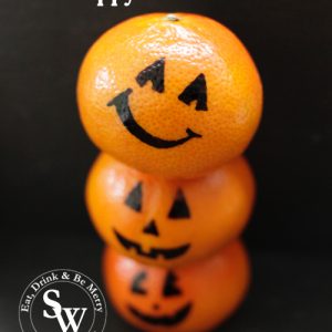 Creating pumpkins out of oranges for healthy halloween snacks